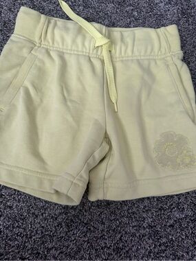 Nike Light Yellow Girls' Drawstring Shorts with Embroidered Flower
